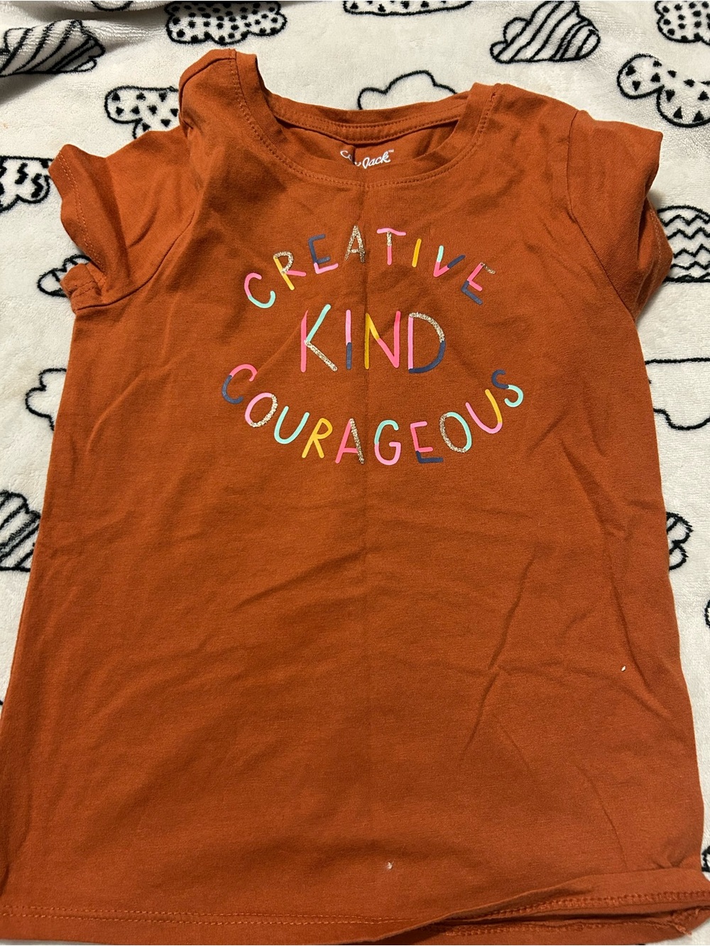 Orange Short Sleeve Tee with 'Creative Kind Courageous' Rainbow Letters